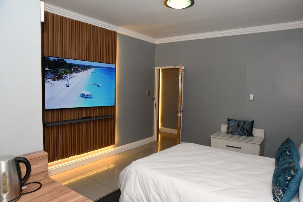 Deluxe Double Room (Room 2) at Al-Beit Lodge, Summerstrand, Gqeberha at night